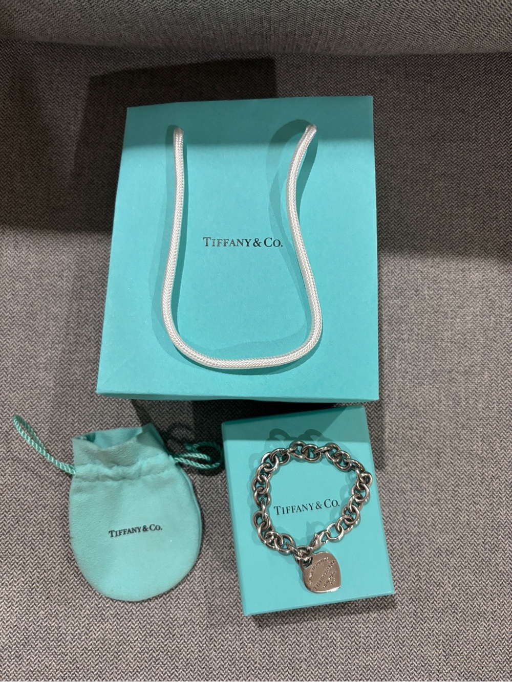Tiffany & Co. Sterling Silver Heart Tag Bracelet with Signature Blue Accents